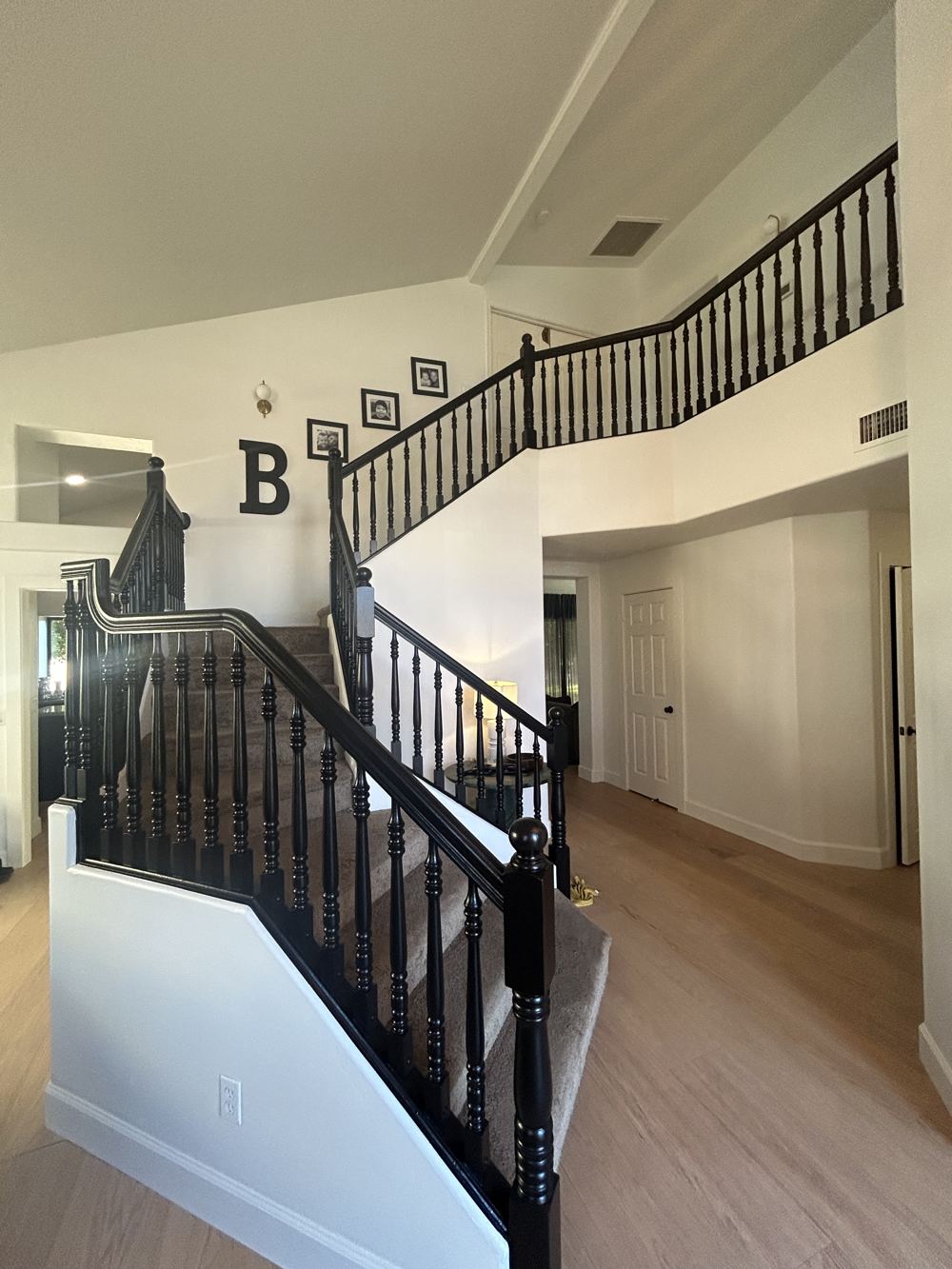 Black painted staircase railing in Gilbert home
